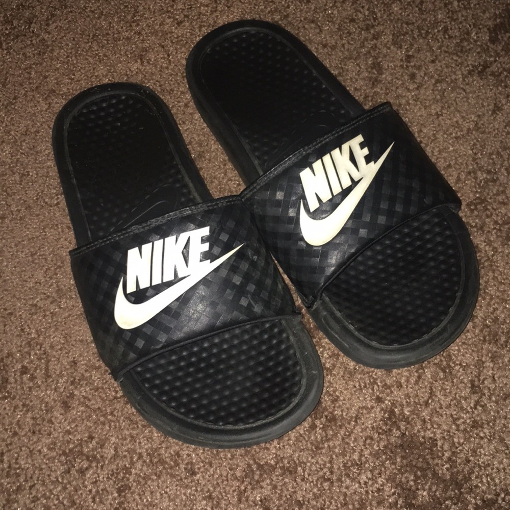 Nike slides.